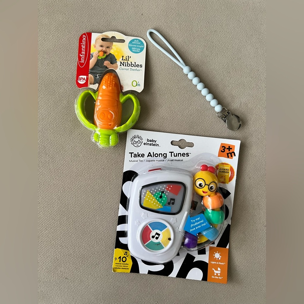 NIB teether & music toy, also used Ryan & rose paci clip